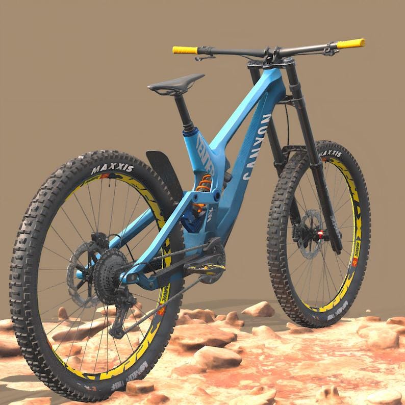 K&ouml;nnte beinhalten: Ein blaues Mountainbike mit schwarzen Reifen und gelben Akzenten. Auf dem Rahmen des Fahrrads steht das Wort "Canyon". Auf den Reifen steht das Wort "Maxxis".