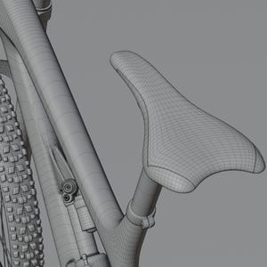 May include: A detailed wireframe rendering of a bicycle, showcasing the seat, frame, and tire. The seat is a light gray color, and the frame has a curved design. The tire has a textured pattern. The image is set against a neutral gray background.