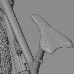 May include: A detailed wireframe rendering of a bicycle, showcasing the seat, frame, and tire. The seat is a light gray color, and the tire has a textured pattern. The frame is a complex design.