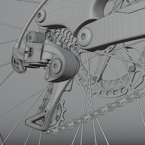 May include: Close-up of a bicycle's rear derailleur, chain, and gears. The components are rendered in a wireframe style, showcasing the mechanical details of the bicycle's drivetrain. The chain links are visible, connecting the gears.