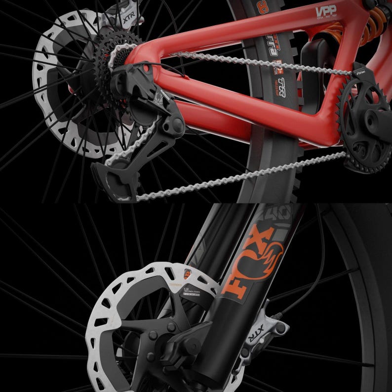 May include: A red mountain bike frame featuring a VPP suspension system, a black SRAM rear derailleur, and a silver chain. The front fork is black with orange Fox branding, paired with a silver disc brake rotor and an XTR brake caliper component.