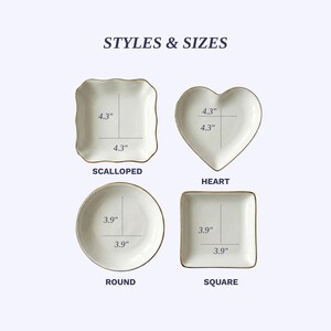 May include: Image showing four white ceramic dishes in different shapes: scalloped, heart, round, and square. Each dish has a gold rim and is labeled with its shape and dimensions in inches. The text "STYLES & SIZES" is at the top.