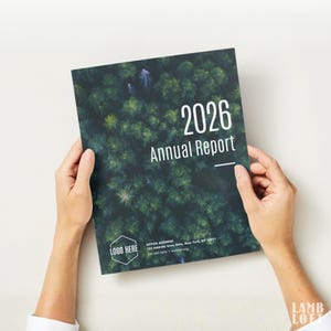 May include: A person holding a 2026 Annual Report. The cover displays a green aerial view of a forest. White text includes the year and report title. A logo and office address are also visible.