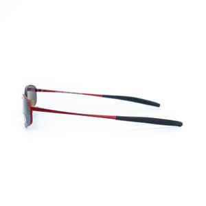 May include: Red-framed sunglasses with dark lenses. The temples are red with black rubberized tips. The sunglasses are set against a white background, showcasing their sleek, modern design. These glasses are suitable for outdoor activities.