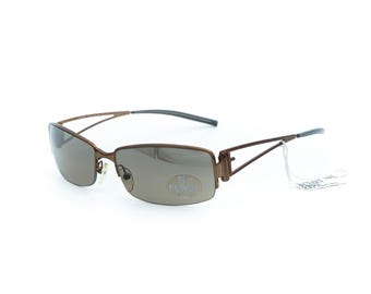 Gafas de sol Fendi SL 7461 sin montura color bronce, estilo vintage.