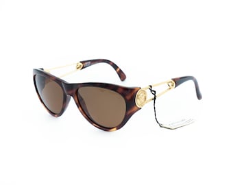Gafas de sol vintage Gianni Versace Mod 427 en dorado y marrón