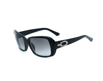 Gafas de sol negras vintage para mujer de Cartier Paris.