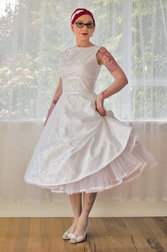 1950's Cordelia White Wedding Dress with a Boat Neck, Lace Overlay, Ribbon Trim, Tea Length Skirt and Petticoat - Custom made to fit 1950's Cordelia White Wedding Dress with a Boat Neck, Lace Overlay, Ribbon Trim, Tea Length Skirt and Petticoat - Custom made to fit