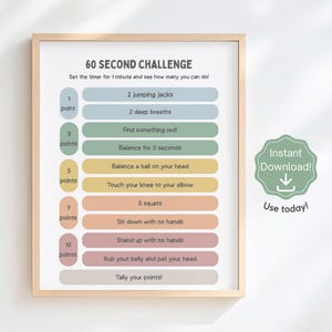 以下が含まれることがあります： 「60 Second Challenge」のテキストとエクササイズの説明が書かれたフレームプリント。カラフルなチャートには、ジャンピングジャック、スクワット、バランスなどのエクササイズが含まれており、それぞれにポイント値が割り当てられています。