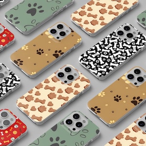 May include: A collection of phone cases with various patterns, including paw prints, dog bones, and pet toys. The cases are in shades of brown, green, red, and black, offering a variety of designs for pet lovers.