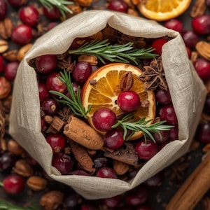 May include: A linen bag filled with cranberries, orange slices, cinnamon sticks, star anise, and rosemary sprigs. The ingredients are scattered on a dark wooden surface, creating a festive and aromatic display. Perfect for potpourri or holiday decor.