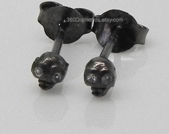 Skull stud earrings, luminous sapphire eyes set in black gold skulls, tiny skull earrings, cartilage earring, helix stud earring,  D800SB