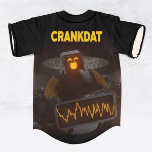 May include: Black baseball jersey with the word "CRANKDAT" in yellow block letters across the upper back. The front features a robot graphic with a glowing yellow face and a waveform display. The sleeves have white trim.