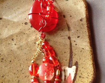 Red glass and brass wire pendant neckace