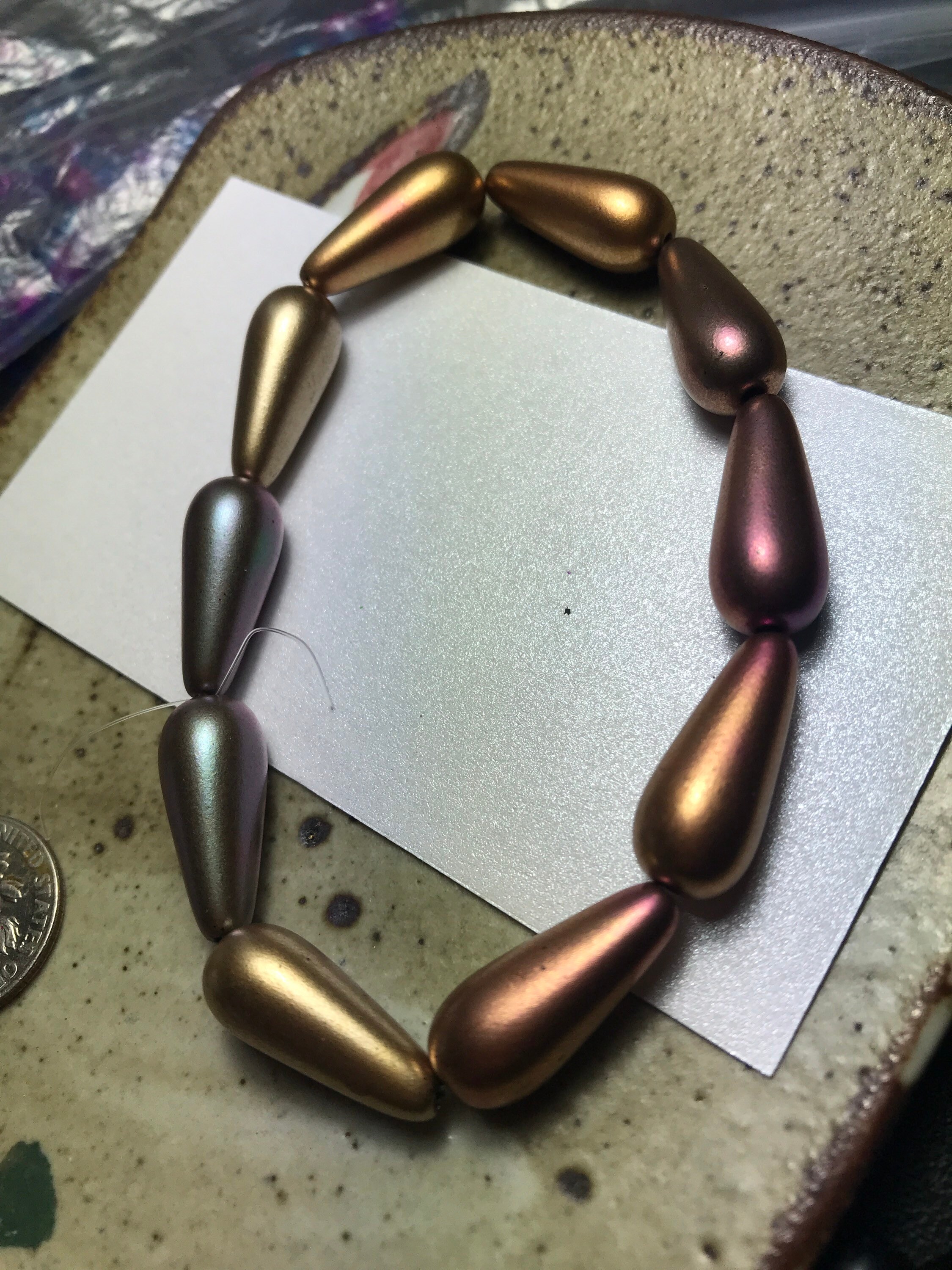Metal teardrop beads deals