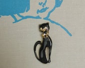 Vintage black cat brooch 70s gold sleek feline jewelry gift animal lover lucky pin girls womens jewellery Dolly Topsy Etsy UK