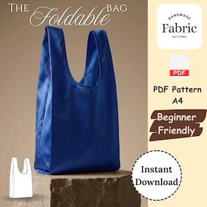 May include: A royal blue foldable bag with two handles. Text on the image reads: THE FOLDABLE BAG, HANDMADE Fabric PATTERNS, PDF, PDF Pattern A4, Beginner Friendly, and Instant Download. A small white line drawing of the bag is in the corner.