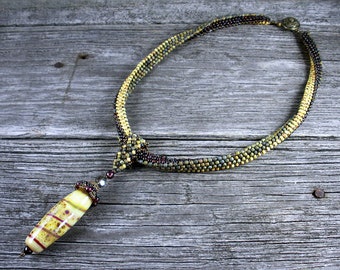 SOLD! Beadweaving: African Polygon Necklace in Rich Garnet/Earth-Tones with Lampwork Glass & Garnet Pendant