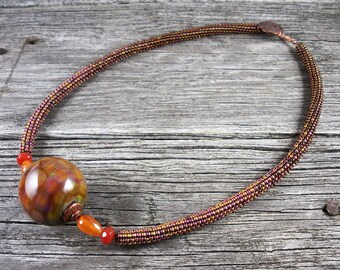 SOLD! Beadweaving: Peyote Necklace with Large, Round Lampwork Bead - Copper Sunset Colors and Carnelian
