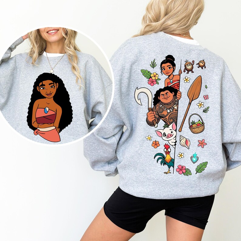 Puede incluir: Sudadera gris claro con una ilustraci&oacute;n de dibujos animados en la parte delantera y un dise&ntilde;o m&aacute;s grande en la parte trasera. El dise&ntilde;o trasero incluye personajes, flores y una cesta. La sudadera es de estilo casual.
