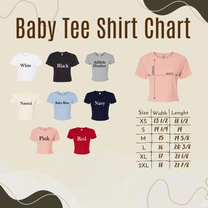 May include: A chart displaying various colors of baby tee shirts, including white, black, athletic heather, natural, baby blue, navy, pink, and red. The chart also includes a size guide with width and length measurements in inches.