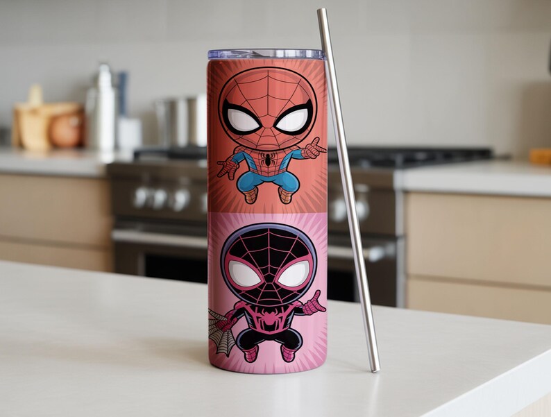May include: A tall, cylindrical tumbler featuring two cartoon Spider-Man characters. The top half displays a red and blue Spider-Man, while the bottom half shows a black and pink Spider-Man. A silver straw is placed next to the tumbler.