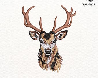 May include: An embroidered deer head design with brown antlers, a detailed face, and a mix of brown, tan, and black fur. The text "3 SIZES" is above the deer. Below the deer are the letters "DST PES EXP VP3 HUS XXX SEW".