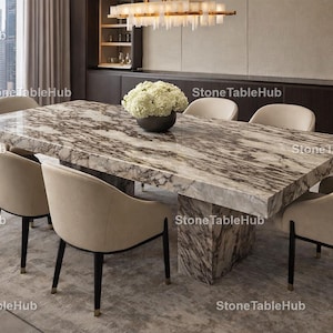 May include: A marble dining table with a rectangular top and a patterned surface. Eight beige upholstered chairs with black legs surround the table. A floral arrangement sits in the center. The room has a modern design. The table is approximately 300 cm long.