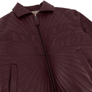 May include: A set of three ceramic mugs with a speckled, matte finish. The mugs are in shades of cream, light gray, and dark gray. Each mug has a simple, minimalist design and a rounded handle.