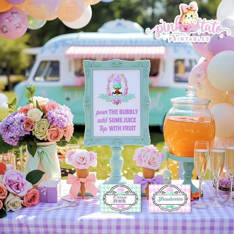 May include: A party scene with a mint green sign that reads "pour the bubbly add some juice top with fruit." The table is set with flowers, juice, champagne, and ice cream cone flowers. Balloons and a vintage trailer are in the background.