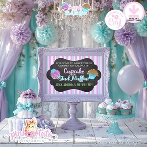 May include: A pastel-themed gender reveal party setting, featuring a sign with the text "Cupcake or Stud Muffin?" in a decorative frame. The image includes cupcakes, a cake, balloons, and floral decorations. The sign also reads "Welcome to Baby Pickles Gender Reveal Party!"