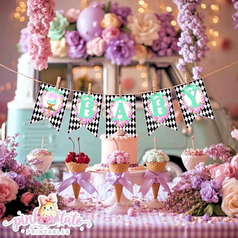 May include: A festive baby shower scene with a banner spelling "BABY" strung across the top. The banner has a black and white diamond pattern with floral accents. The table is decorated with ice cream cones, cakes, and flowers in pastel colors.