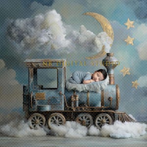 May include: A newborn baby sleeps on a fluffy cloud inside a vintage blue train engine. The background features a crescent moon, stars, and clouds, creating a dreamy, whimsical scene. The image has a soft, muted color palette.