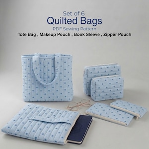 以下が含まれることがあります： 斑点のあるマット仕上げのセラミックマグカップ3個セット。マグカップはクリーム色、ライトグレー、ダークグレーの色合いです。各マグカップはシンプルでミニマリストなデザインです。