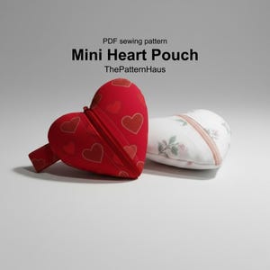 May include: A red heart-shaped pouch with a zipper and heart patterns, next to a white floral heart-shaped pouch. The text "Mini Heart Pouch" and "ThePatternHaus" are visible. This is a PDF sewing pattern.