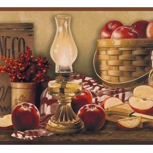 May include: A still life featuring red apples, a vintage oil lamp, and wooden baskets. The scene includes a wooden crate with text, a jar, and a wooden cutting board with apple slices. The overall theme is rustic and autumnal.