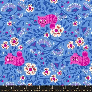 May include: A blue fabric with a repeating pattern of pink Cheshire cats, white and pink flowers, and blue floral vines. The text "RUBY STAR SOCIETY" is printed at the bottom of the image.