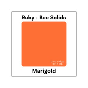 May include: A square swatch of Marigold fabric from the Ruby + Bee Solids collection by Blue Ridge Quilt Co.