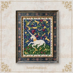 May include: Framed cross-stitch artwork featuring a white unicorn in a floral setting. The background is a deep blue with red berries and yellow accents. The frame is dark blue with ornate detailing and the text "NobleLadyPupsik".