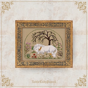 May include: Cross-stitch artwork of a white unicorn resting under a tree, surrounded by flowers. The framed piece has a gold ornate frame. The artwork is on a beige background. The text "NobleLadyPupsik" is at the bottom.