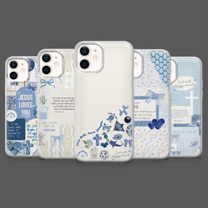 May include: Five phone cases in a white and blue colour scheme. Each case has a unique design, with text, crosses, bows, and floral patterns. The cases have a clear protective outer layer.
