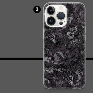 May include: A phone case with a dark, detailed pattern of skulls and skeletal figures. The case is clear, allowing the phone's design to be partially visible. The number "3" is in a white circle in the upper left corner.