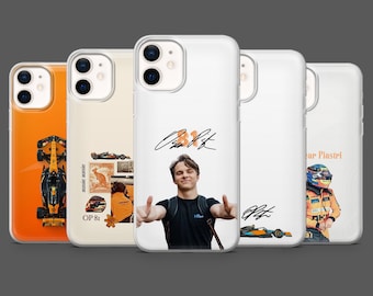 May include: A collection of five phone cases. The cases feature various designs, including a Formula 1 race car, a kangaroo, a portrait with a signature, and a race car driver. The cases are white, orange, and beige.