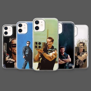 May include: A collection of phone cases featuring action movie imagery. The cases display images of a man holding a weapon, wearing sunglasses, and in various action poses. The cases are clear with the images visible.