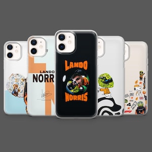 May include: A collection of five phone cases featuring various designs. One case displays "LANDO NORRIS" in orange text, another showcases a portrait of Lando Norris, and others feature racing-themed graphics and illustrations.