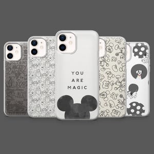 May include: Five phone cases with different designs. One case has the text "YOU ARE MAGIC" and a Mickey Mouse silhouette. Other cases show Mickey Mouse, Winnie the Pooh, and Dalmatian patterns. The cases are white with black and grey graphics.