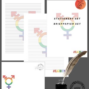 Può includere: Un set di cancelleria bianco con un simbolo transgender arcobaleno. Il set include carta a righe, una busta e un foglio con le parole "STATIONERY SET" e "BRIEFPAPIER SET". Sono presenti anche una penna e inchiostro. L'hashtag #LGBTO è visibile.
