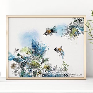 Watercolor painting of two goldfish swimming in a blue and green underwater scene with floral details. The painting is framed in a light wood frame.