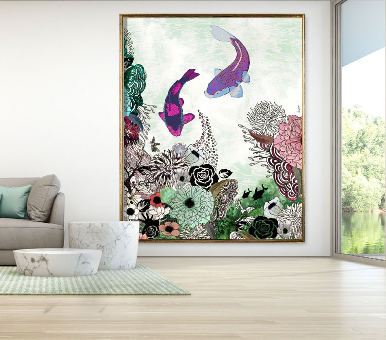 A framed illustration of two pink and purple fish swimming in a green and white floral background. The fish are surrounded by flowers and leaves in shades of pink, green, black, and white.