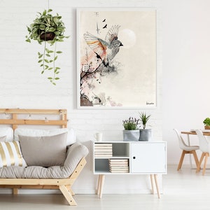 A framed illustration of a bird in flight with a moon in the background. The bird is drawn in black and white with orange and pink accents. The background is a light beige with a subtle texture. The illustration is framed in a white frame.